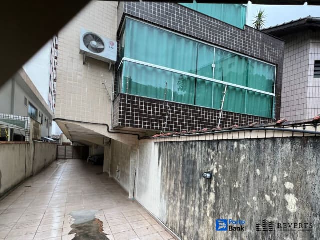 Casa em leilão extrajudicial em Embaré, Santos — Rua Professor Torres Homem, 486